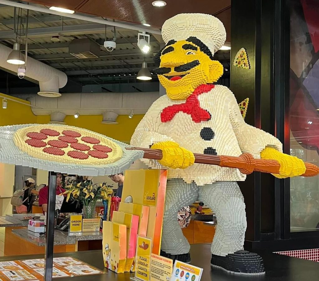 A giant pizza chef at Pizza Mania restaurant in Imagination